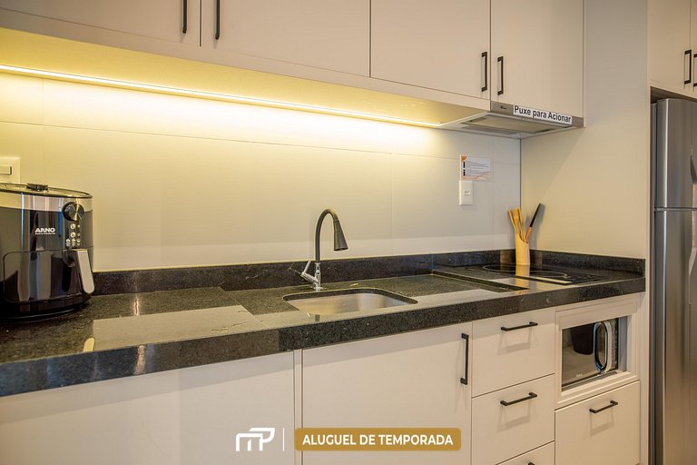126 - Flat com piscina aquecida e jacuzzi